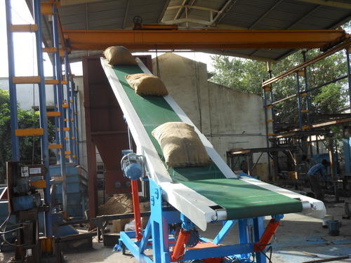 Truck loading conveyors